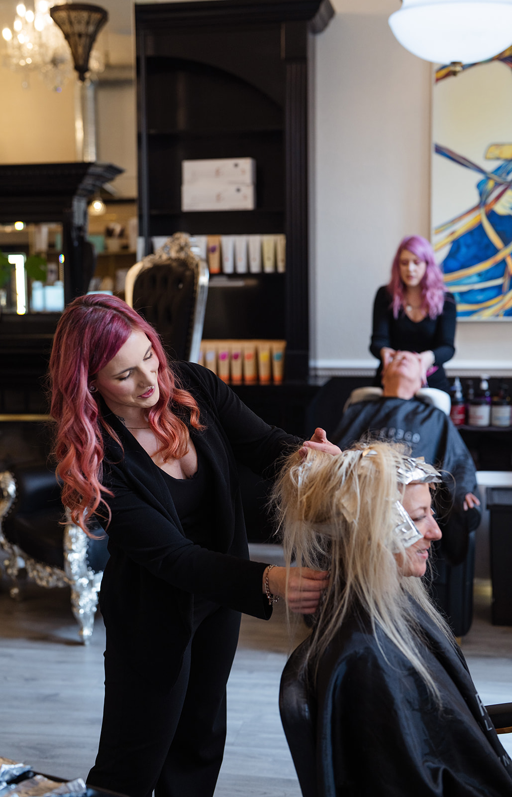 Fluff stylists at our LoDo Denver salon — warm team culture and elevated guest experience