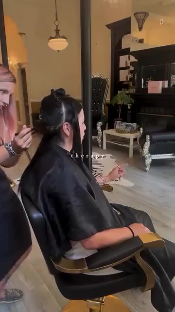 Hand-tied weft hair extensions being installed at Fluff Colour Salon Denver