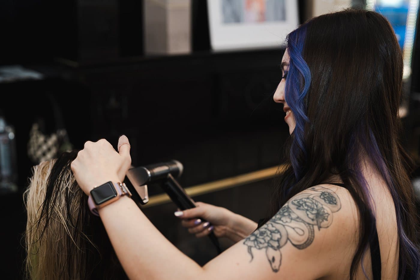 Colourist giving a blowout at Fluff Colour Salon Denver